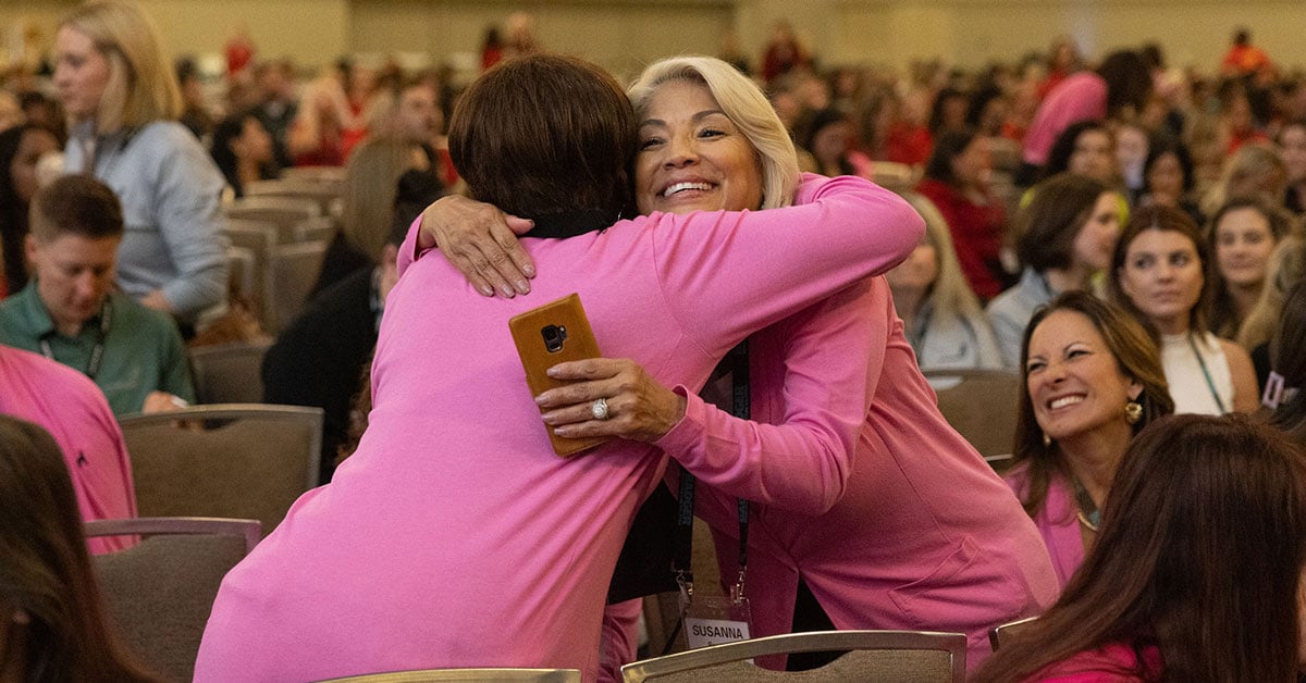 2023-Accelerate-Conference-Attendees-Hugging-800x800